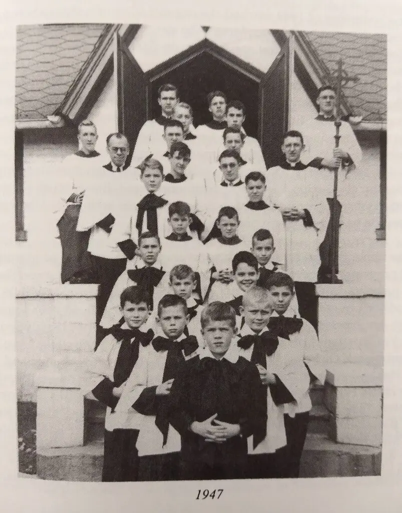Picture of Boys Choir from 1947 on steps of the church.