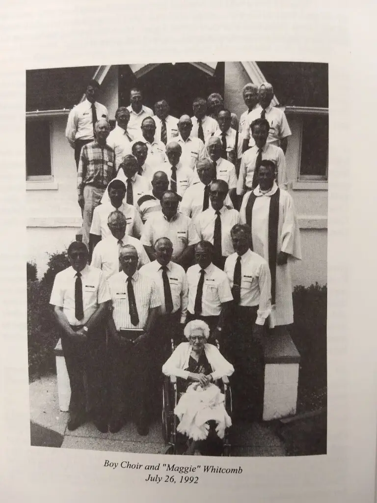 Picture of the Boys Choir reunion in 1992 on the front steps of the church.